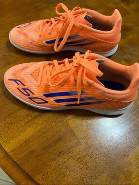Orange Adidas Shoes with Blue Accents
